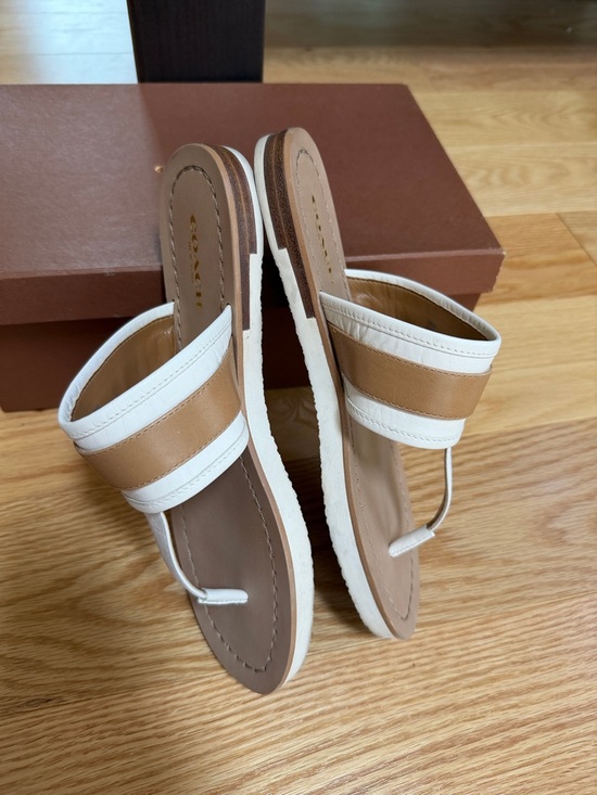 Coach  women’s 5.5M, White and Tan Eileen Leather Slide Sandals with Gold Logo.